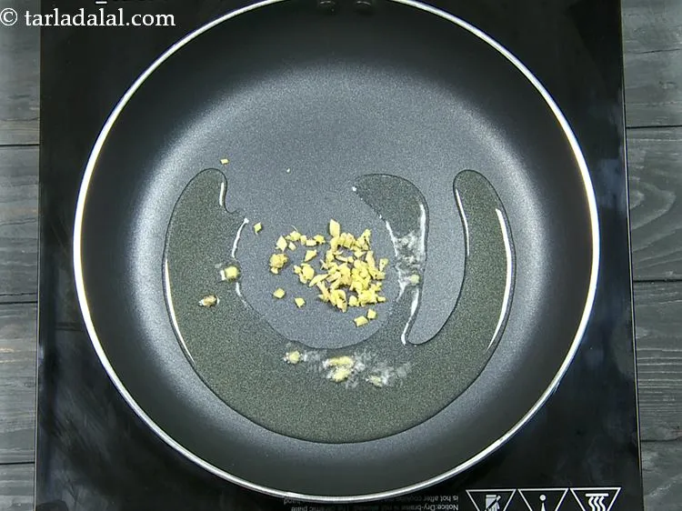 Step 6 – Once the oil is hot, add ginger. Instead of fresh aromatics, you can use it …