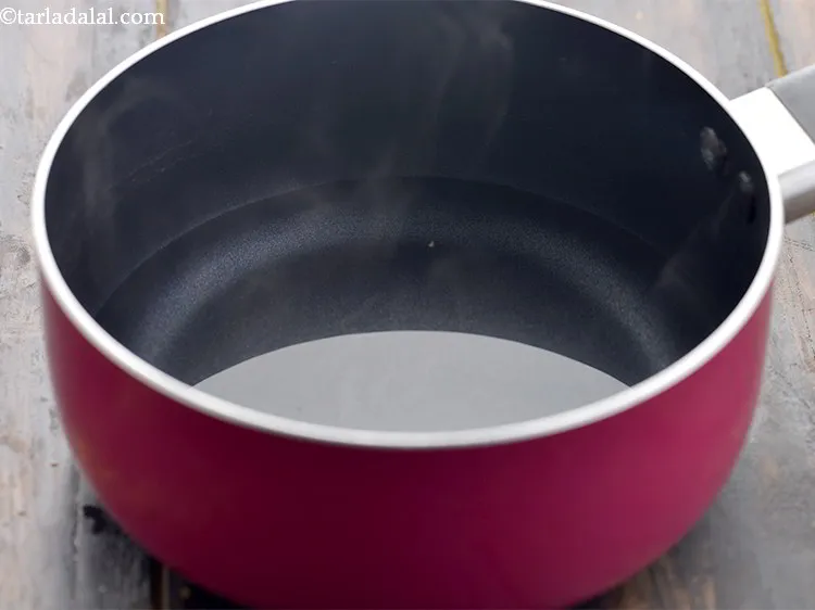 Step 26 – Add 3 cups of hot water. This helps to reduce cooking time.&nbsp;
