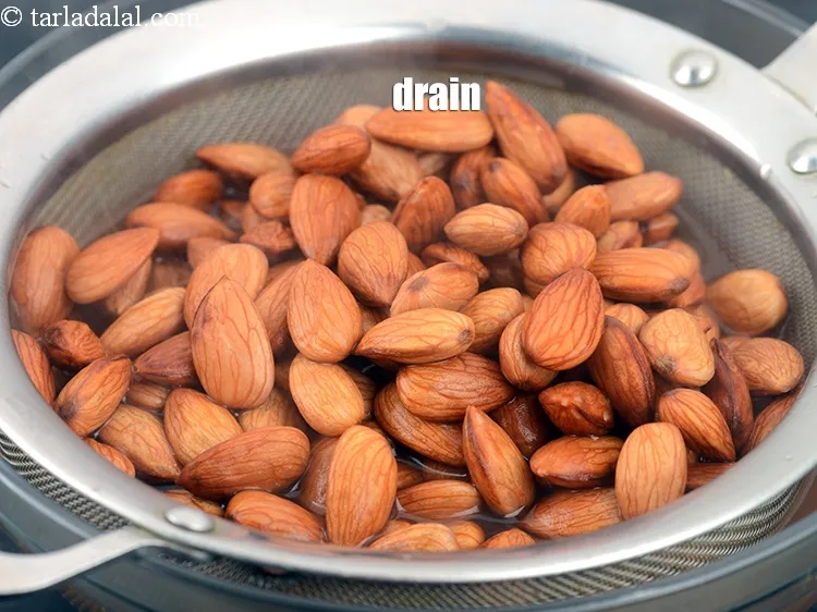 Step 7 – Drain the almonds.