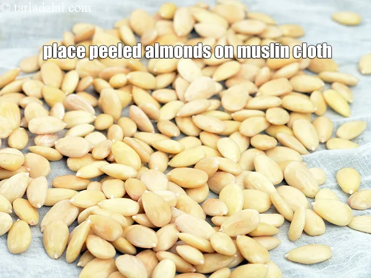 Step 9 – Place the peeled almonds on a muslin cloth.
