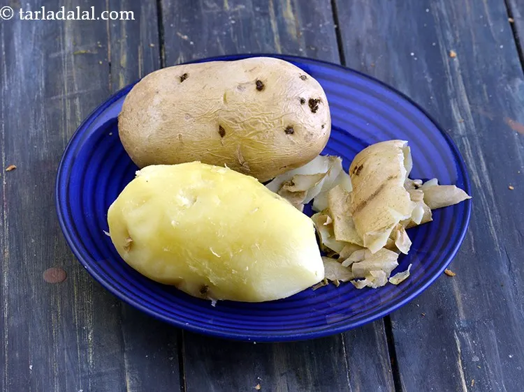 Step 19 – Remove the potato from the microwave and peel them. Dsicard the peels.&nbsp;