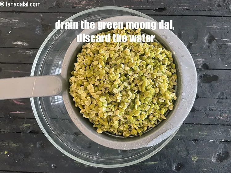Step 10 – Drain the green moong dal using a strainer. Discard the water. Keep the dal aside.