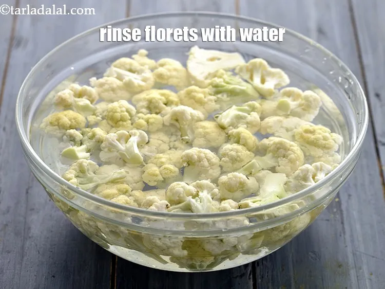Step 5 – Rinse the cauliflower florets with water.