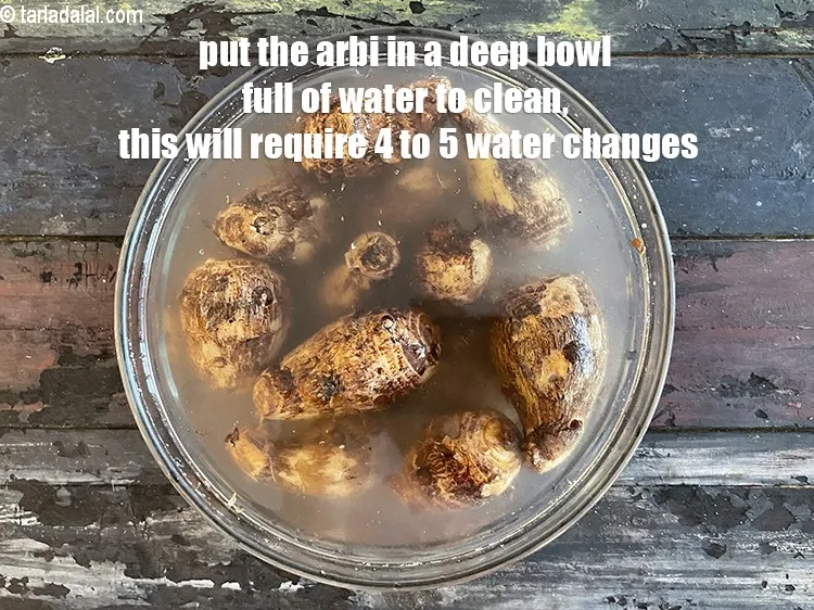 Step 5 – Put the arbi in a deep bowl of water and clean it. There is lots …