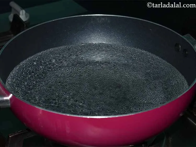 Step 11 – Boil 4 cups of water in a deep non-stick pan.