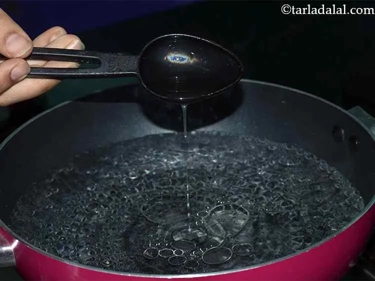 Step 7 – Furthermore, add 1 tbsp of oil and mix well.