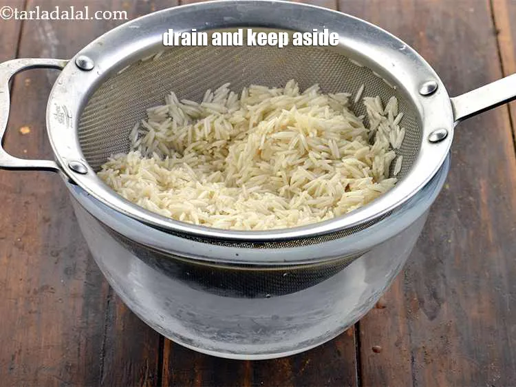 Step 11 – Drain with the help of a strainer and keep aside.