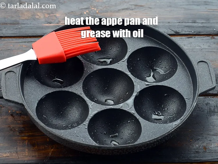 Step 23 – Heat the appe pan on a medium flame and grease it with 1 tsp of&nbsp;&nbsp;<a …