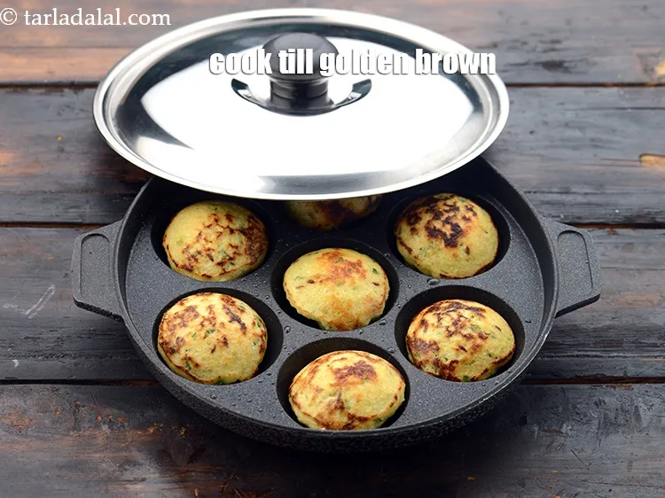 Step 26 – Cook on a medium flame till the outer surface becomes golden brown and then turn …