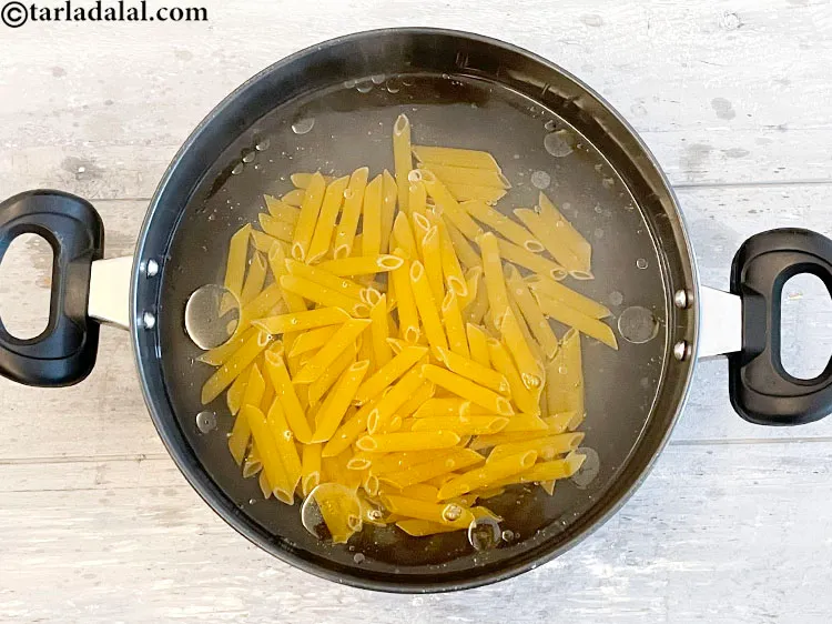 Step 6 – <p>Add the pasta to the boiling water by adding a few strands or one sheet …