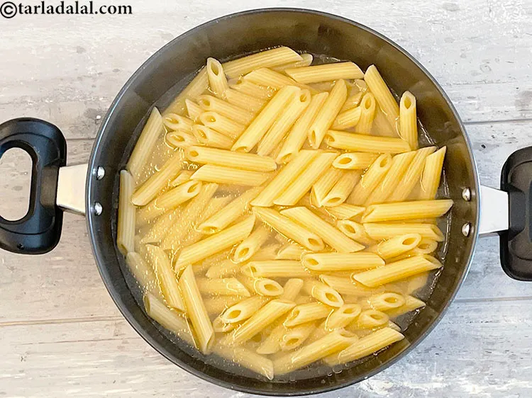 Step 9 – <p>Again continue to cook uncovered, stirring occasionally and gently until the pasta is tender.&nbsp;Cooking times …