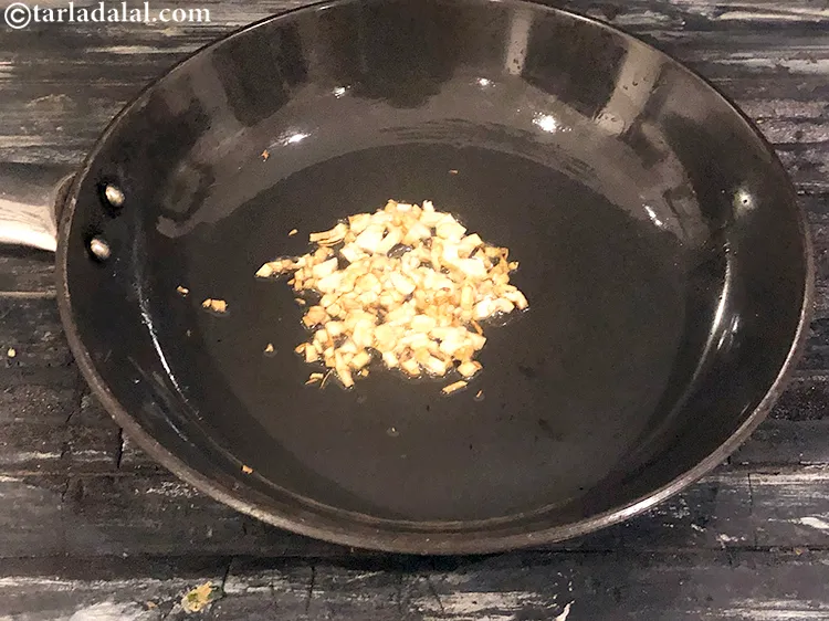 Step 10 – Saut&eacute; the garlic for 30 seconds on a slow flame.