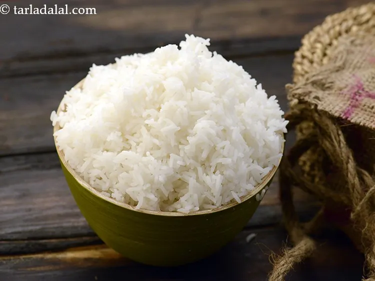 Step 9 – Add the 3/4 cup&nbsp;<a href="https://www.tarladalal.com/glossary-soaked-and-cooked-rice-1906i">steamed rice (chawal)</a>, cooled and mashed slightly. You can cook rice …