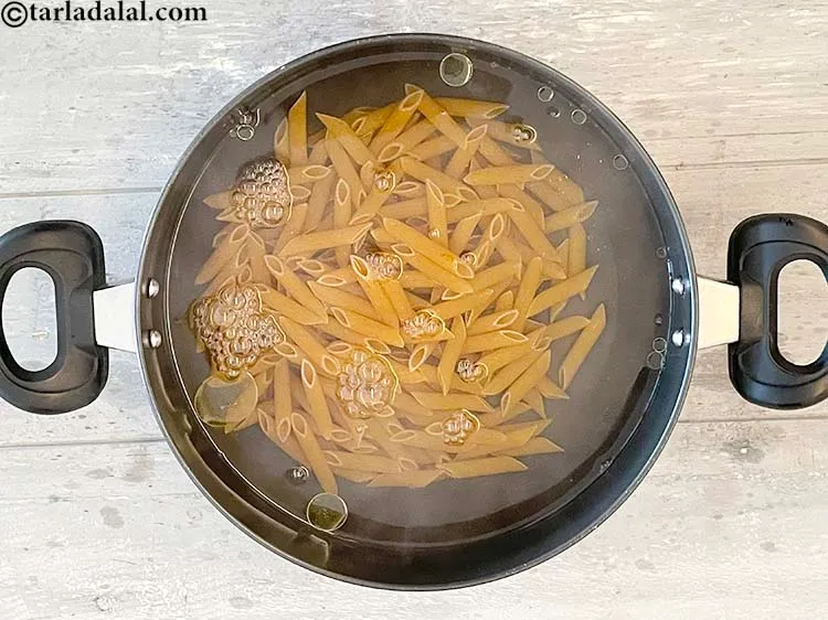 Step 7 – Add the pasta to the boiling water by adding a few strands or one sheet …