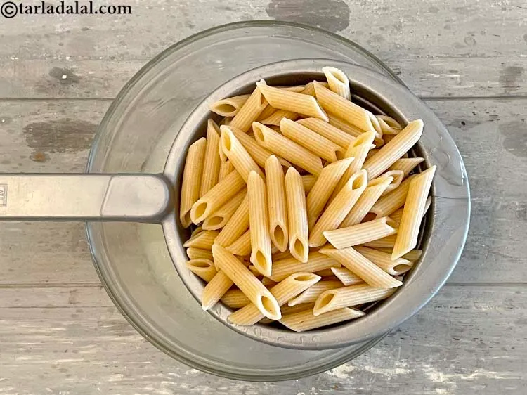 Step 11 – Immediately drain the cooked whole wheat pasta into a sieve or a colander.&nbsp;&nbsp;