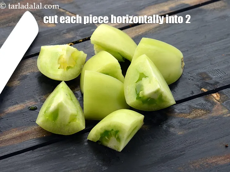 Step 8 – Then cut each piece horizontally into 2. From 1 tomato you will get 8 pieces …