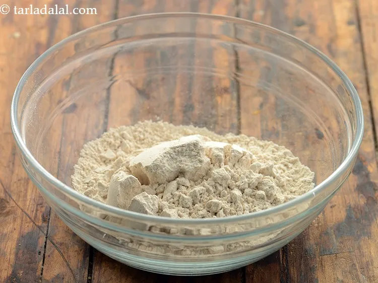 Step 3 – For the dough, in a deep bowl add 2 cups&nbsp;<a href="https://www.tarladalal.com/glossary-whole-wheat-flour-gehun-ka-atta-gehun-ka-aata-429i">whole wheat flour (gehun ka …