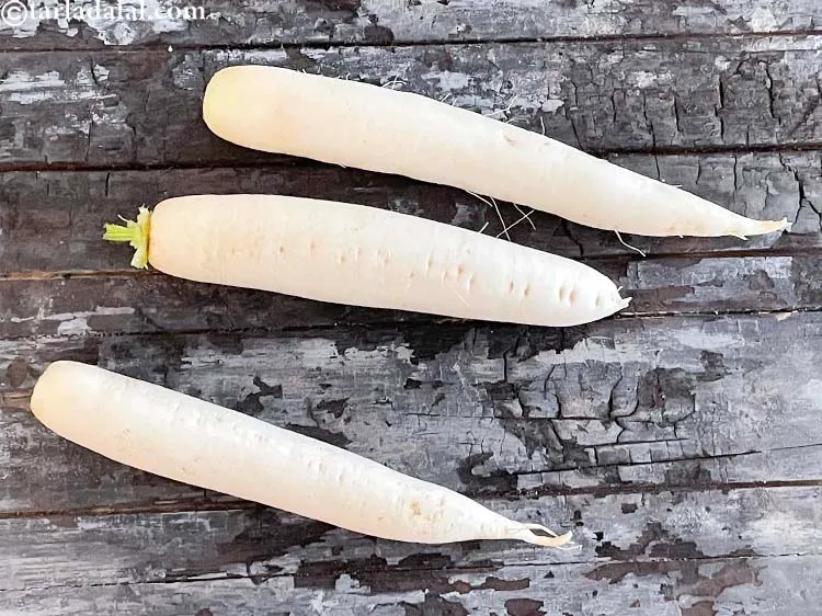 Step 5 – Wash the mooli in running water to remove the dirt stuck to it.