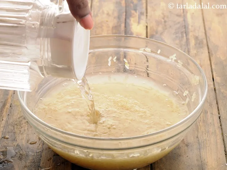 Step 12 – Similarly, wash the par-boiled rice with water.
