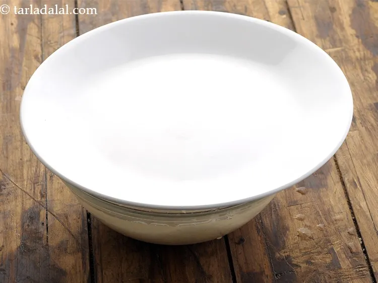 Step 16 – Cover the bowl with a lid and keep it aside to soak for at least …