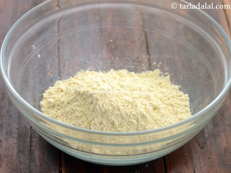 Step 10 – <meta charset="UTF-8" />Place the besan aka gram flour and pass it through the sieve.&nbsp;<br /> …