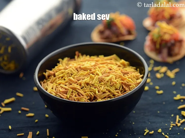 Step 32 – Using baked sev makes the recipe healthy to have. Follow our recipe of baked sev …