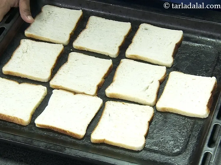 Step 2 – Place all the bread slices on a baking tray. There is no need to grease …