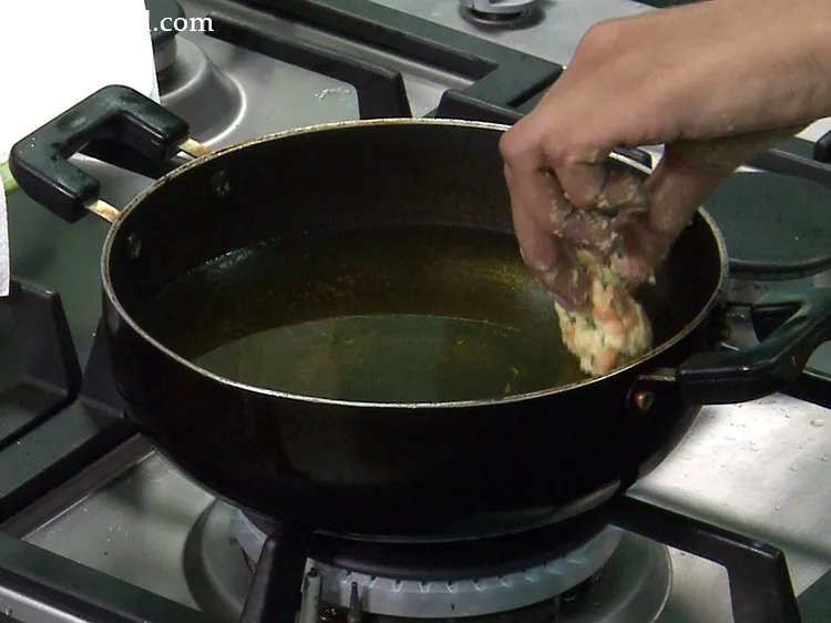 Step 28 – It is best to roll the fritters one by one and add them directly in …