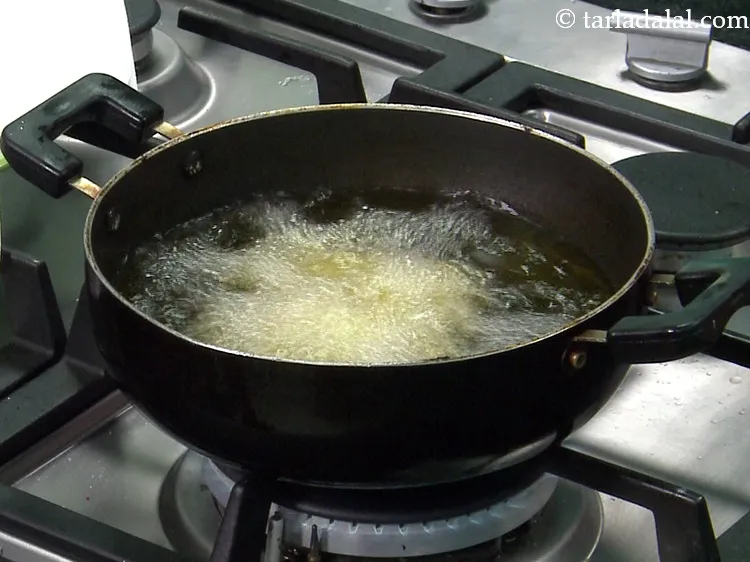 Step 29 – Deep fry the fritters only on a medium flame and not high flame.&nbsp;