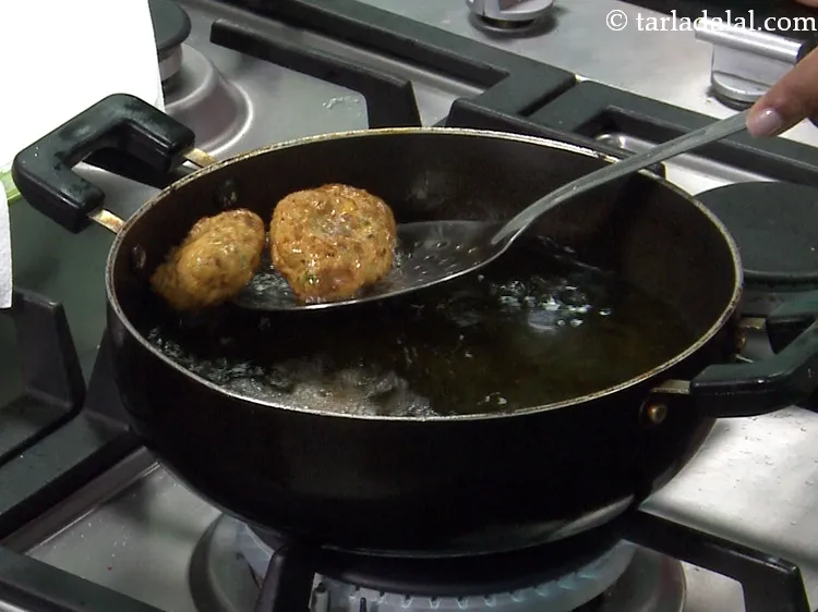 Step 23 – Deep-fry all 4 at a time on a medium flame till they turn golden brown …