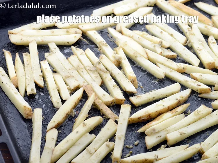 Step 21 – Place the potatoes on the greased baking tray in a single layer.