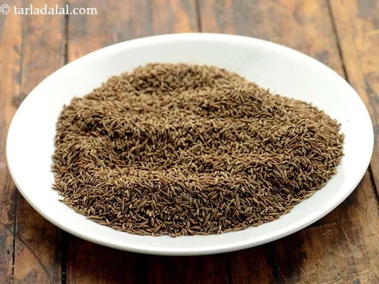 Step 7 – Transfer them on a plate and keep aside to cool for 2 minutes.