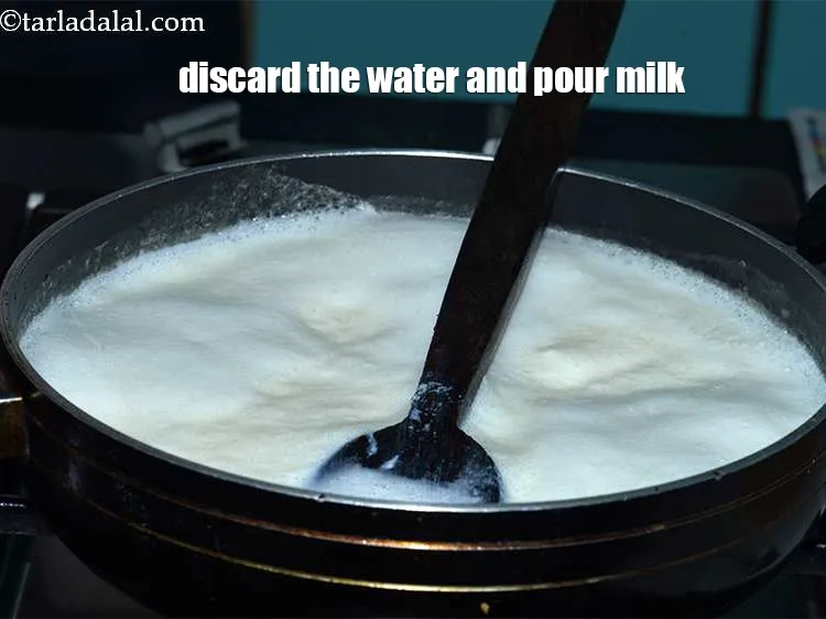 Step 5 – Discard the water and pour the full fat milk into the pan. We have used …