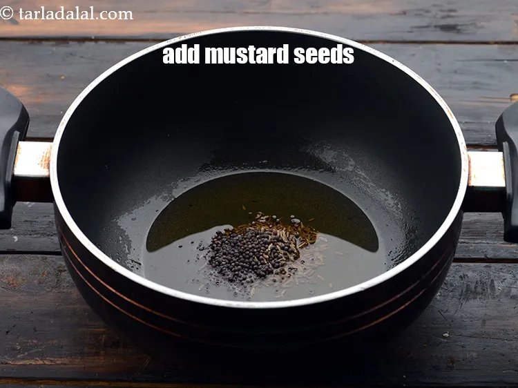 Step 25 – Add&nbsp;1/2 tsp&nbsp;<a href="https://www.tarladalal.com/glossary-mustard-seeds-sarson-rai-sarson-ke-beej-525i">mustard seeds ( rai / sarson)</a>.&nbsp;