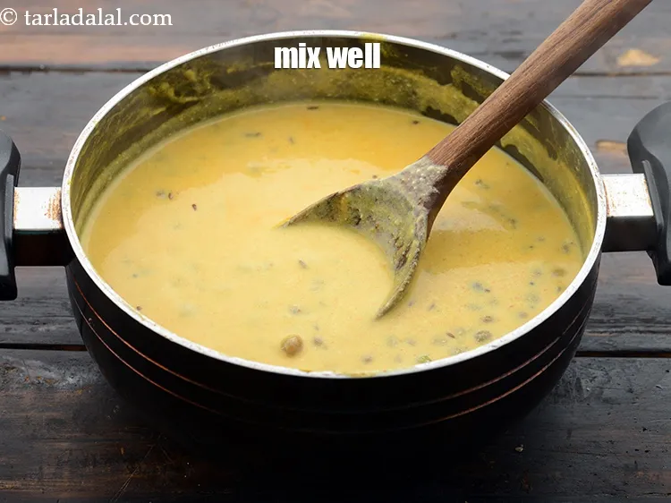 Step 31 – <p>When you are cooking the brown chana and curd0besan mixture, make sure you do not …