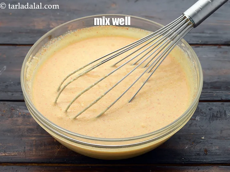 Step 22 – Mix well using a whisk till no lumps remain. Keep aside.&nbsp;