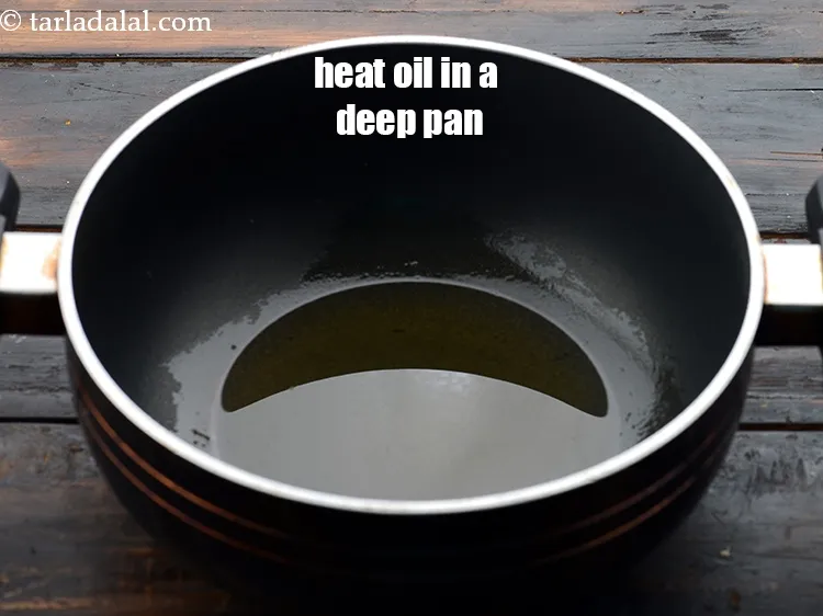 Step 23 – Heat 1 1/2 tbsp&nbsp;<a href="https://www.tarladalal.com/glossary-oil-671i">oil</a>&nbsp;in a deep non-stick pan.