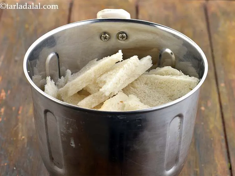 Step 6 – Add the bread slices to a mixer jar.