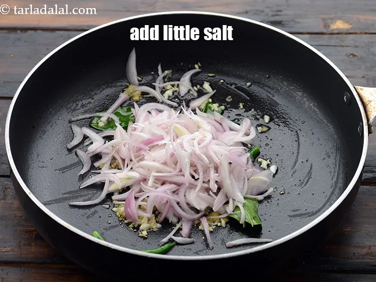 Step 33 – Add little <a href="https://www.tarladalal.com/glossary-salt-namak-table-salt-418i">salt</a>&nbsp;.&nbsp;