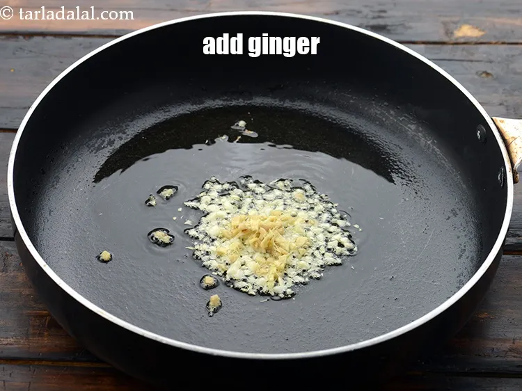 Step 28 – Add 1 tsp&nbsp;finely&nbsp;<a href="https://www.tarladalal.com/glossary-chopped-ginger-786i">chopped ginger (adrak)</a>.
