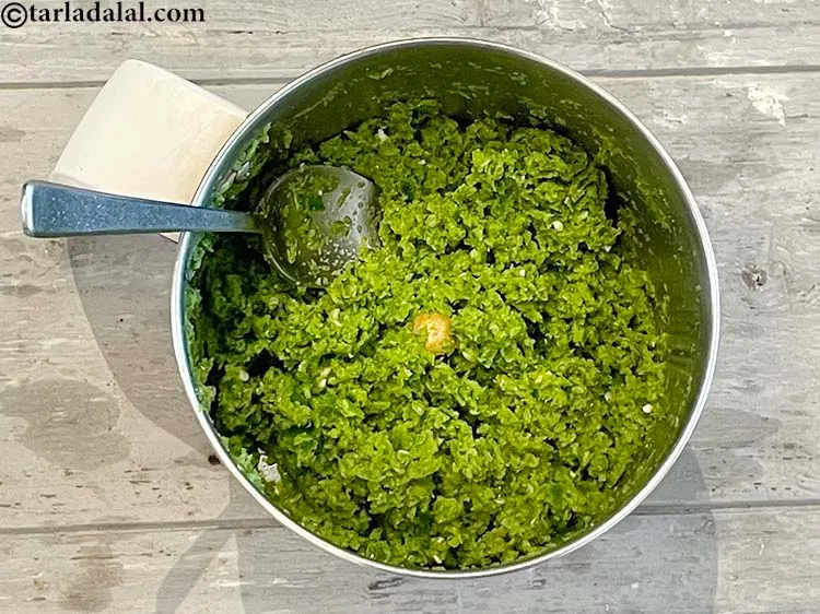 Step 13 – Again use the spoon to bring the paste to the centre. We can see we …