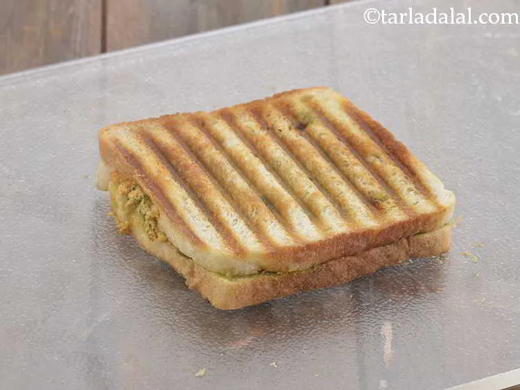 Step 15 – Grill the sandwich in a greased hot griller till it turns golden brown in colour …