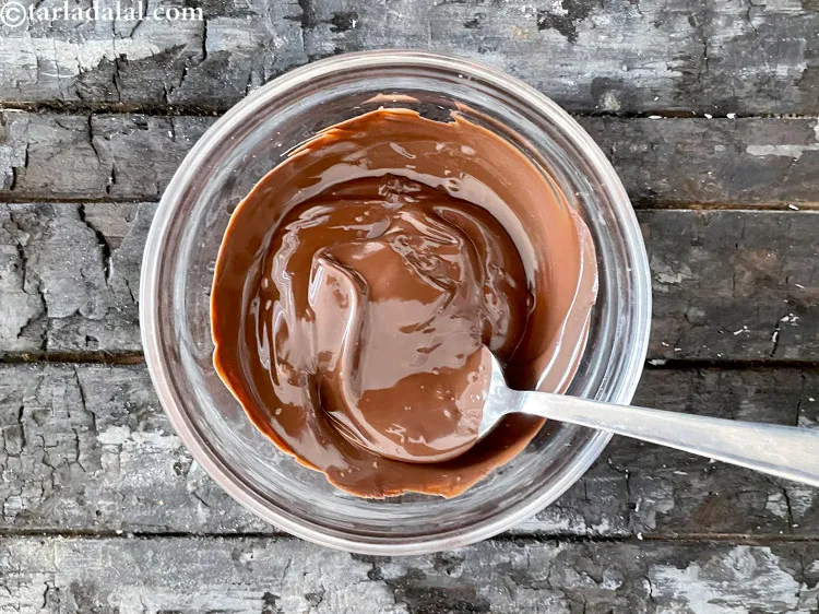 Step 12 – Use a spoon to mix the melted chocolate. Just a little&nbsp;mixing and the chocolate melts …