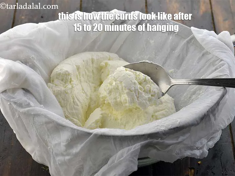 Step 9 – This is how the curds look like after 15 to 20 minutes of hanging.