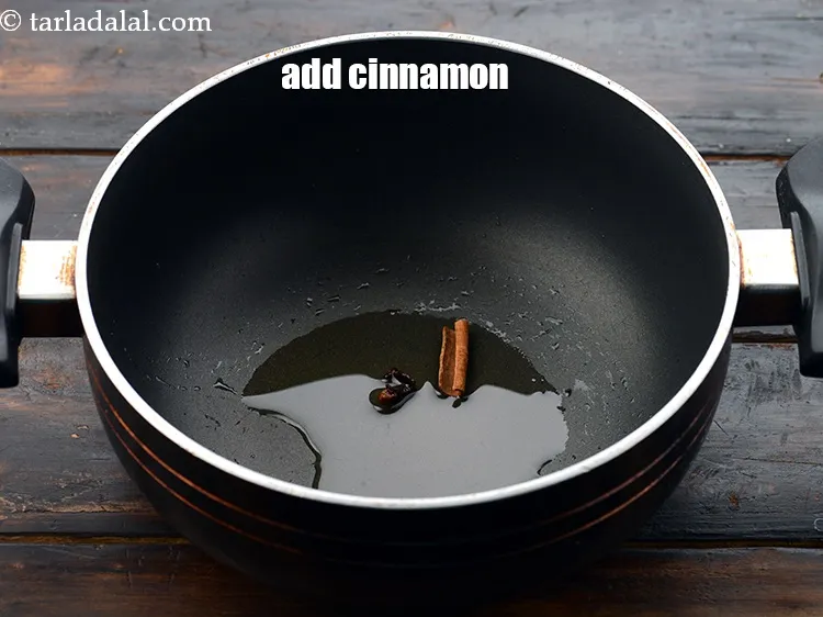 Step 15 – Add 25 mm&nbsp;(1&quot;) stick of&nbsp;<a href="https://www.tarladalal.com/glossary-cinnamon-dalchini-346i">cinnamon (dalchini)</a>.&nbsp;