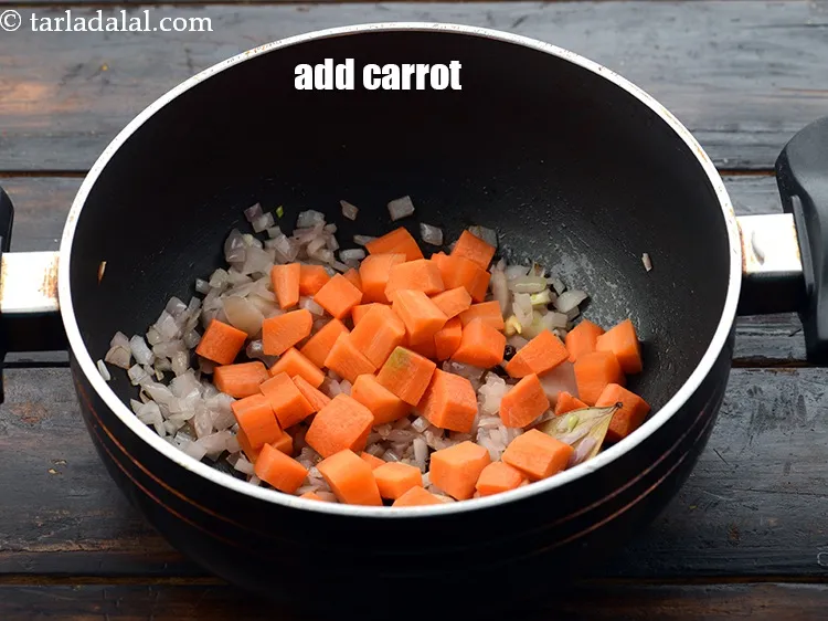 Step 20 – Add 1/2 cup&nbsp;<a href="https://www.tarladalal.com/glossary-carrot-cubes-730i">carrot cubes</a>.&nbsp;