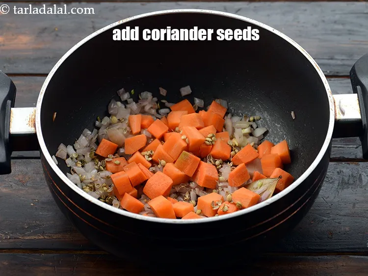 Step 21 – Add 1 tsp&nbsp;<a href="https://www.tarladalal.com/glossary-crushed-coriander-seeds-2301i">crushed coriander (dhania) seeds</a>.&nbsp;
