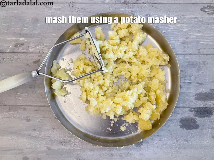Step 25 – Mash them using a potato masher or heavy fork. Ensure that there are no lumps …