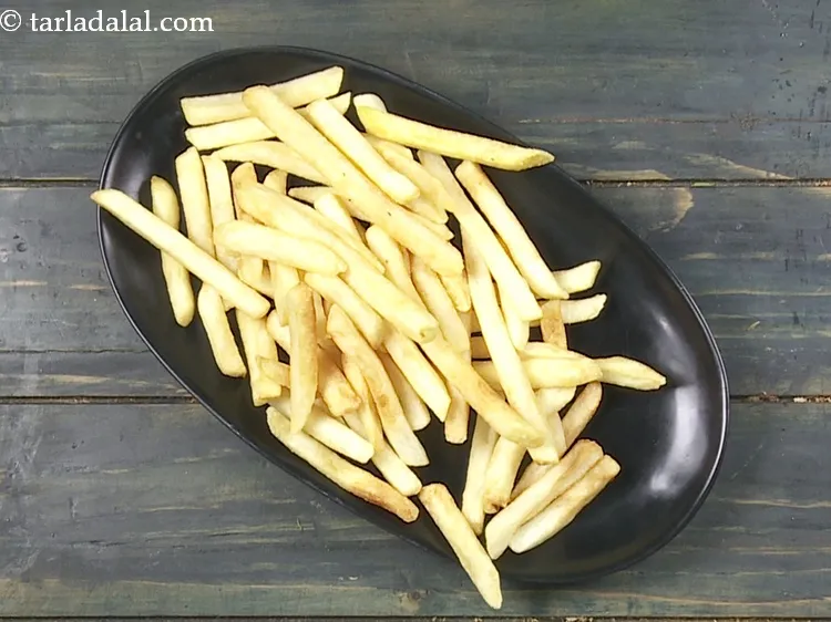 Step 27 – To make <strong>Mexican French fries recipe | French fries with Mexican mix | Indian cheesy …