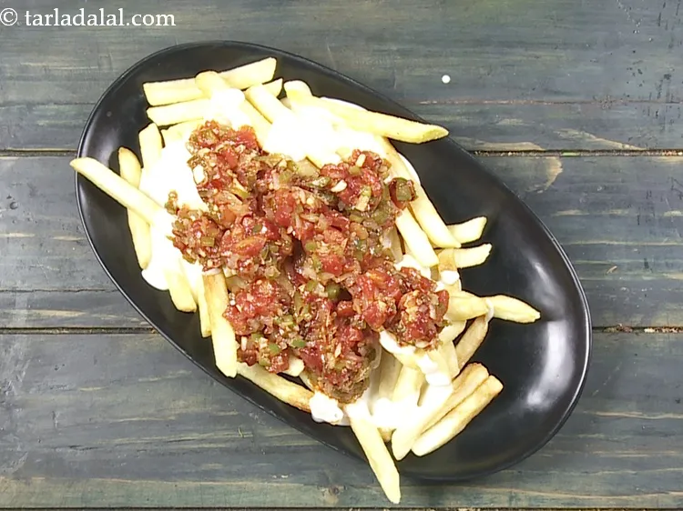 Step 29 – Then spread the Mexican salsa evenly over it.